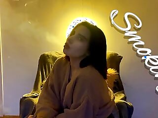 Sexy alternative girl smokes..