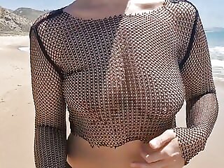 On a public beach, after a..