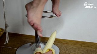 Foot slave eats from her bare